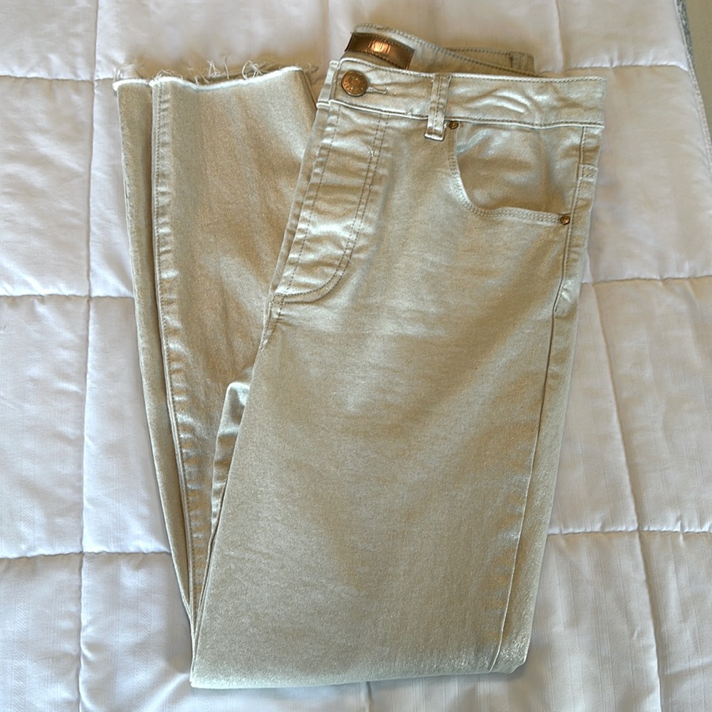 Shimmery gold and cream pants with frayed bottoms. Ankle length.